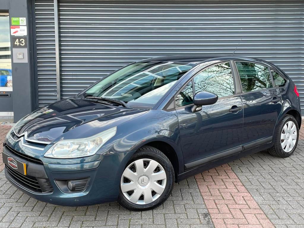 Citroen C4 1.4 16V Anniversaire Airco | Cruise | Pdc | Clima, Auto's, Voorwielaandrijving, Stof, 4 cilinders, Blauw