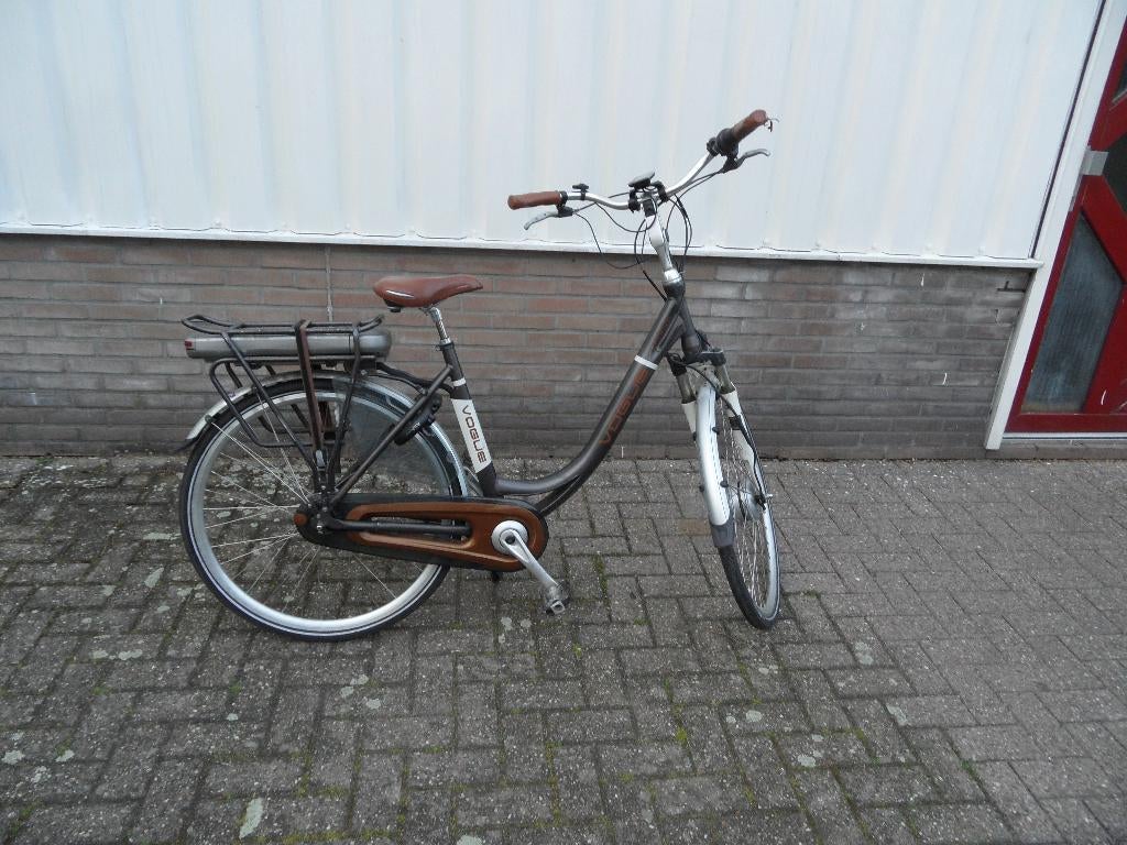 Elektrische fietsen merk vogue handrem en 7 versnellingen, Fietsen en Brommers, Elektrische fietsen, Gebruikt, 55 tot 59 cm, 30 tot 50 km per accu