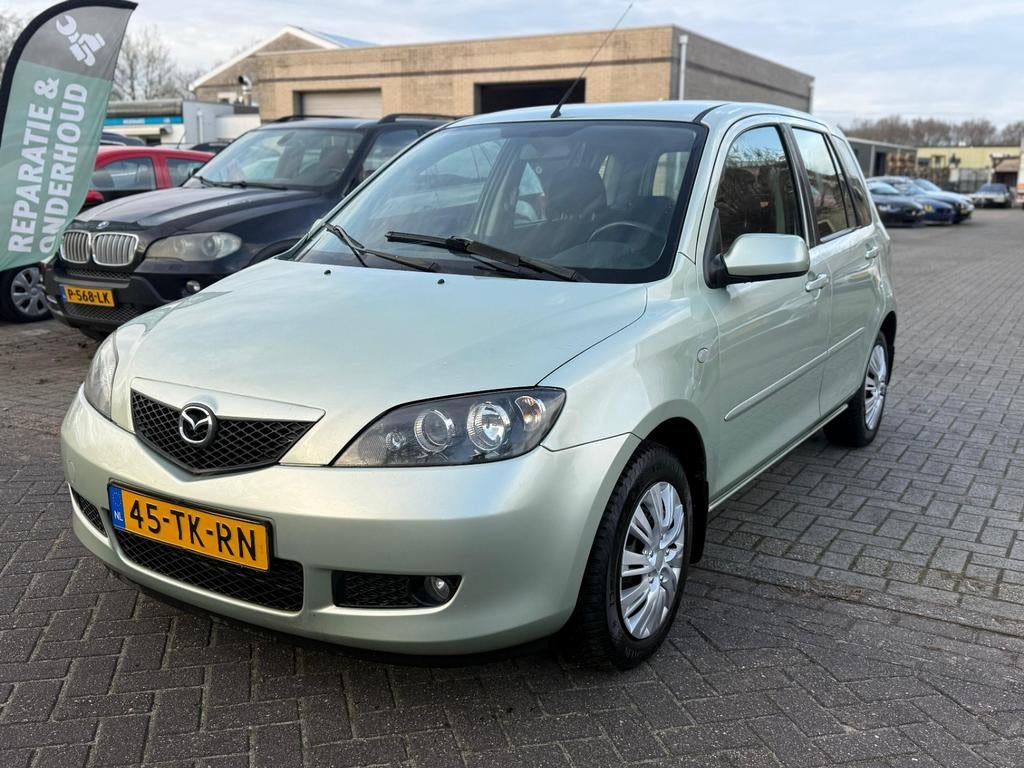 Mazda 2 1.4 16V 2006 Beige, Auto's, Mazda, Voorwielaandrijving, 1025 kg, 15 km/l, 4 cilinders