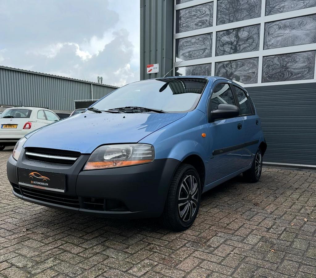Chevrolet Kalos 1.4 2006 Blauw, Auto's, Chevrolet, Stof, 40 €/maand, 4 cilinders, Origineel Nederlands