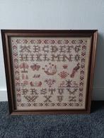 Oude merklap, handgeborduurd, ABC, Ophalen