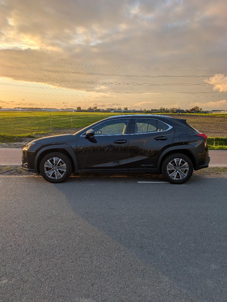Lexus UX 300e 204pk Aut 2020 Zwart, Auto's, Lexus, Stof, Elektronische parkeerrem, Origineel Nederlands, Elektrisch