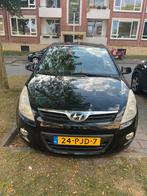 Hyundai i20 1.4 5-DRS 2011 Zwart, Auto's, Voorwielaandrijving, Zwart, 4 cilinders, 100 pk