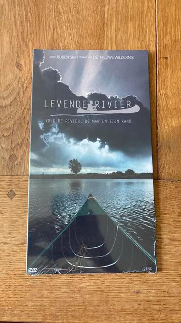 Levende Rivier Volg de rivier, de man en zijn kano NIEUW beschikbaar voor biedingen