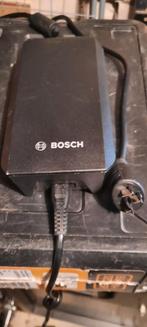 Bosch oplader voor een electrische fiets,, Fietsen en Brommers, Fietsaccessoires | Fietsaccu's, Ophalen of Verzenden, Zo goed als nieuw