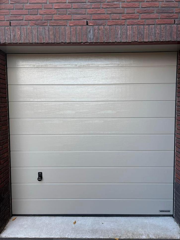 Hormann LPU 42 sectionale Garagedeur RAL7030 steengrijs, Doe-het-zelf en Verbouw, Deuren en Horren, Zo goed als nieuw, Garagedeur