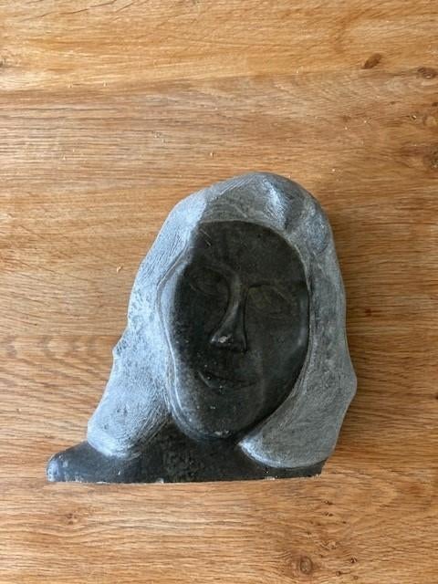 Vrouwen hoofd, Ophalen