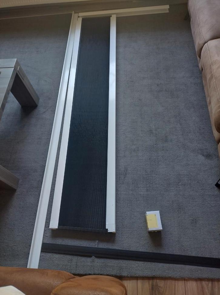 Nieuwe Unilux plissé fit easy hordeur 201/202*110cm ral 9010, Doe-het-zelf en Verbouw, Deuren en Horren, Nieuw, Hordeur, 200 tot 215 cm