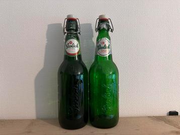 Twee lege Grolsch Beugel flessen beschikbaar voor biedingen