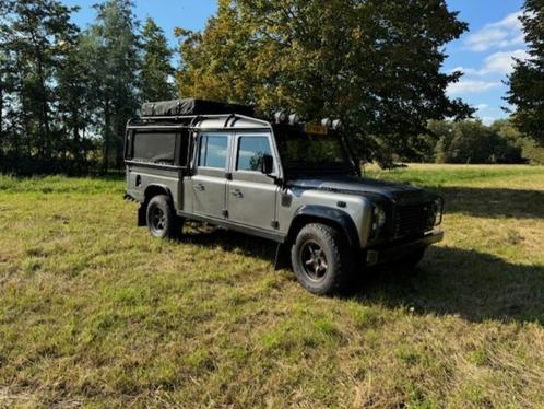 Land Rover Defender 130 TD5 6 pers met daktent en luifel, Auto's, Land Rover, Particulier, 4x4, Airconditioning, Alarm, Bluetooth