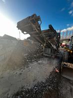 Puinbreker op haakarmslede pegson bekkenbreker, Ophalen