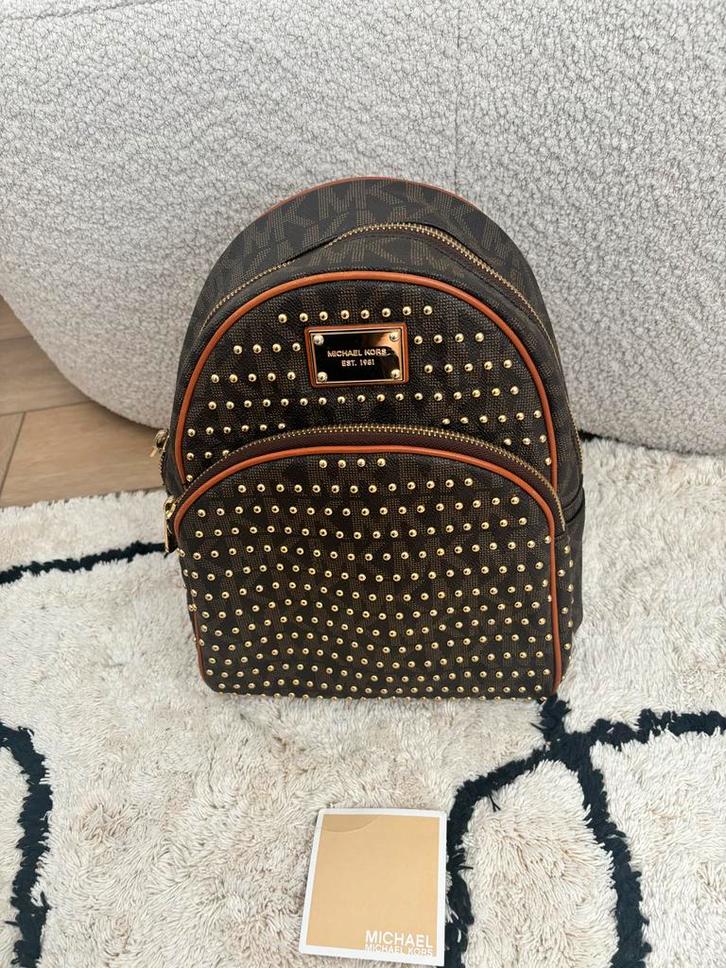 Michael Kors Rugtas Bruin Studs - Weinig Gebruikt!, Sieraden, Tassen en Uiterlijk, Tassen | Rugtassen, Zo goed als nieuw, Overige merken