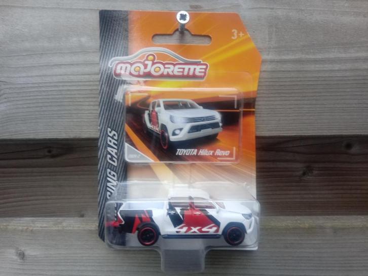 Toyota Hilux Revo Majorette, Hobby en Vrije tijd, Modelauto's | Overige schalen, Nieuw, Auto, Ophalen