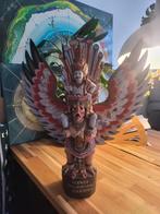 Caroeda houten beeld Wisnoe, Ophalen