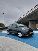 Toyota Aygo 1.0 12V Vvt-i 5DRS 2013 Grijs, Voorwielaandrijving, Stof, 4 stoelen, Handgeschakeld