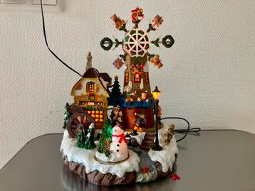 Kerstdorp prachtig grote molen en huis verlichting en muziek beschikbaar voor biedingen