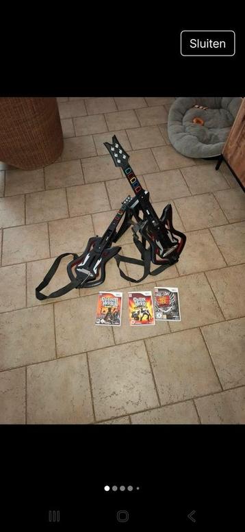 Nintendo wii Guitar Hero set met standaard en 3 games . beschikbaar voor biedingen