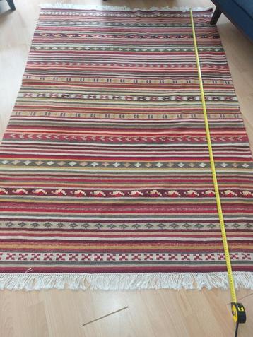 Vloerkleed 210 x 140 met warme natuur tinten  beschikbaar voor biedingen