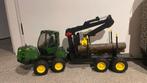 Bruder John Deere 1210E bosbouwtractor met boomstammen, Ophalen of Verzenden, Zo goed als nieuw