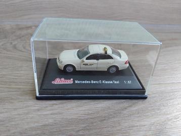 HO Schuco Mercedes-Benz E-Class Taxi model schaal 1:87 beschikbaar voor biedingen