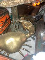 Skeleton footbase, Ophalen, Brons