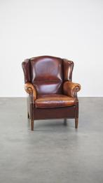 Comfortabele, statige oorfauteuil gemaakt van schapenleer, Huis en Inrichting, Fauteuils, Ophalen, Gebruikt, 75 tot 100 cm, Klassiek, Vintage, Modern