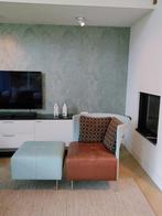 Design leren fauteuil plus poef, Ophalen, Gebruikt, 50 tot 75 cm, Leer