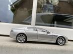 1:18 Aston Martin Rapide 6.0 V12 zilver 2010 Autoart / JJTOP, Hobby en Vrije tijd, Ophalen of Verzenden, Zo goed als nieuw, Autoart