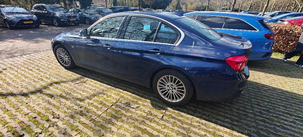 BMW 3-Serie 318i 136pk Aut 2017 Blauw, Automaat, Zwart, Blauw, 75 €/maand
