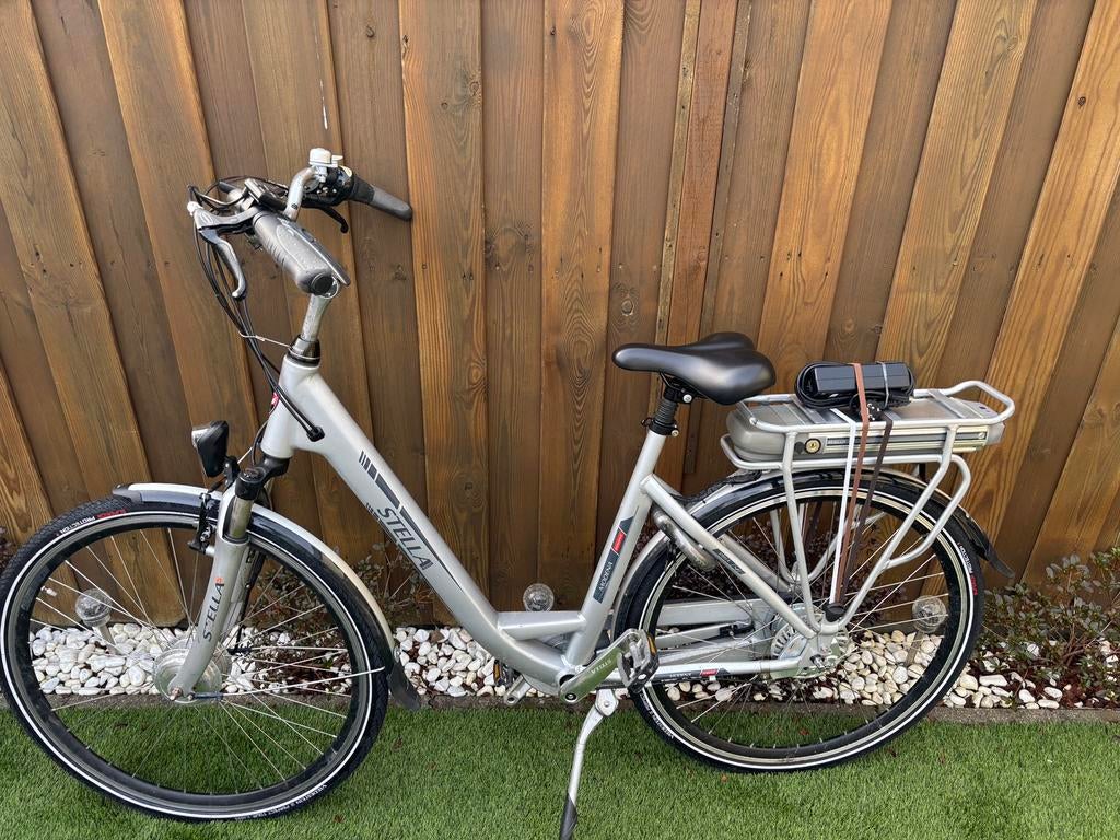 Elektrische fiets Stella Modena, Fietsen en Brommers, Elektrische fietsen, Gebruikt, 51 tot 55 cm, 50 km per accu of meer, Ophalen