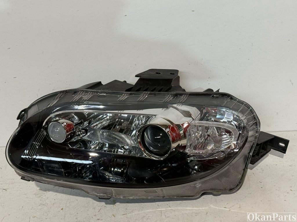 Mazda MX-5 linker koplamp links NE99-51-0L0 100-61384, Ophalen of Verzenden, Gebruikt