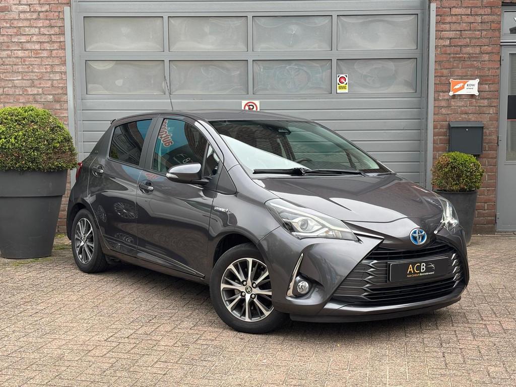 Toyota Yaris 1.5 Hybrid Y20 20 Jaren editie Automaat., Auto's, Euro 6, 4 cilinders, Lichtsensor, Origineel Nederlands