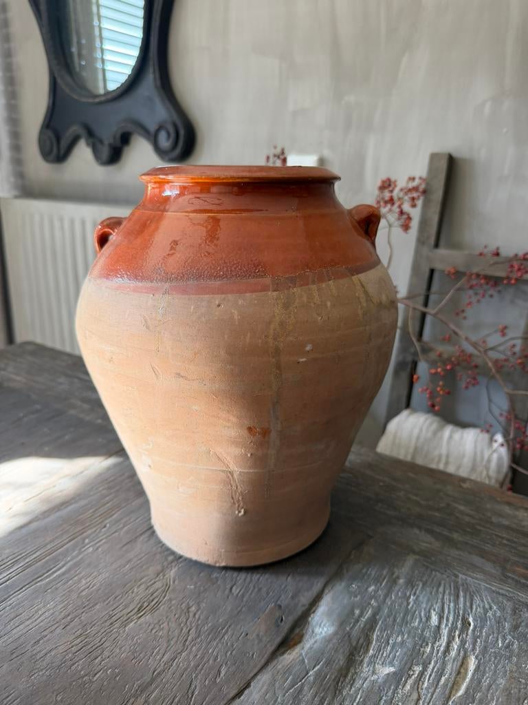 Kruik met oortjes, Ophalen