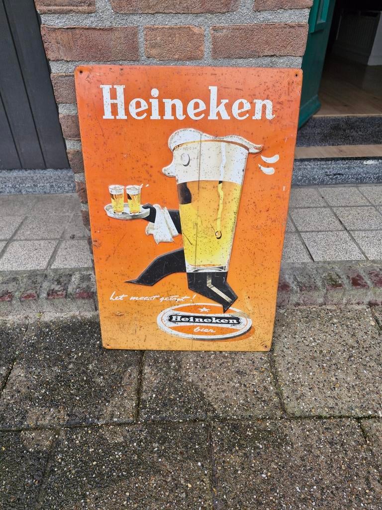 Vintage Heineken Reclamebord - 'Let maar glijden', Ophalen of Verzenden, Gebruikt, Reclamebord
