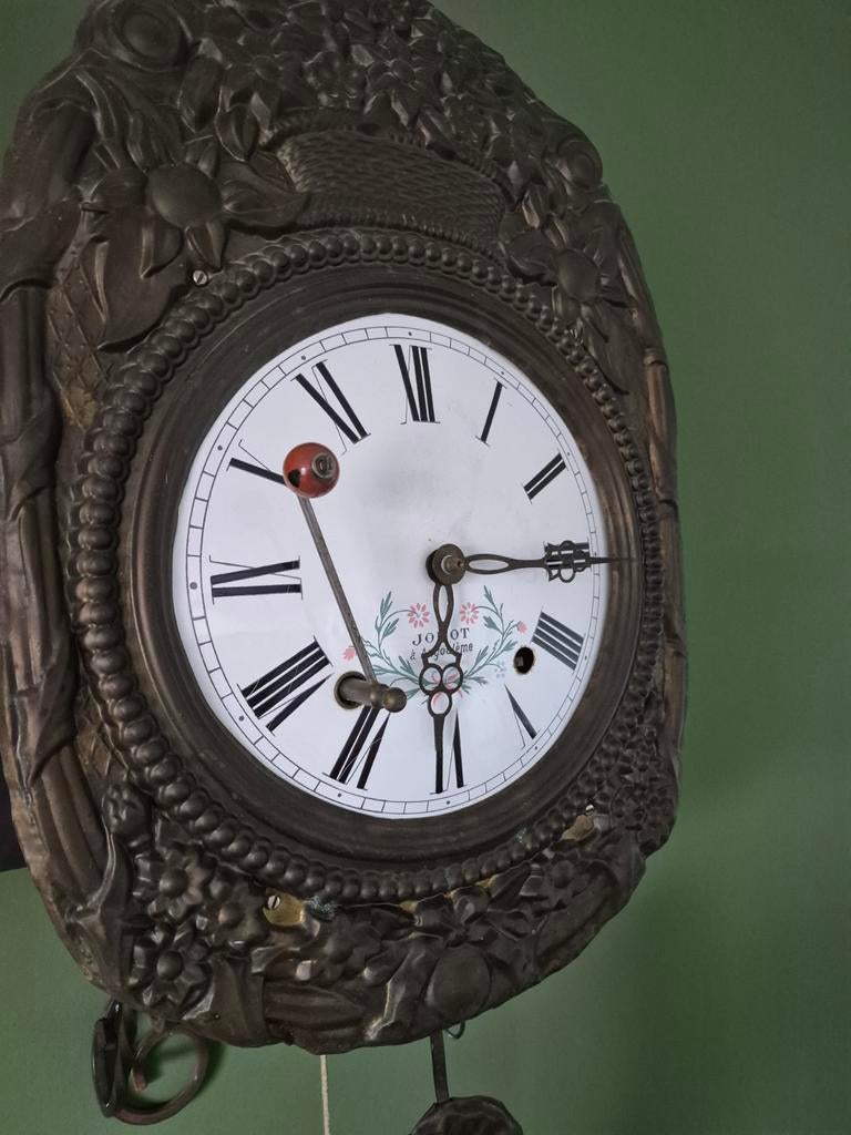 Oude klok met bel en gewichten, Ophalen