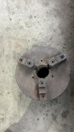 3 klauw draaibank, Ophalen