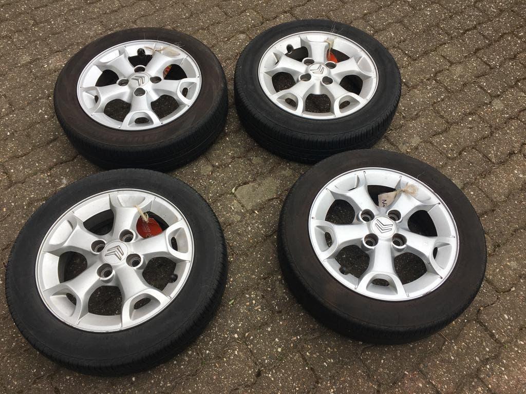 4 velgen + banden + wielbouten voor Citroen C1, Ophalen, Gebruikt, Citroën