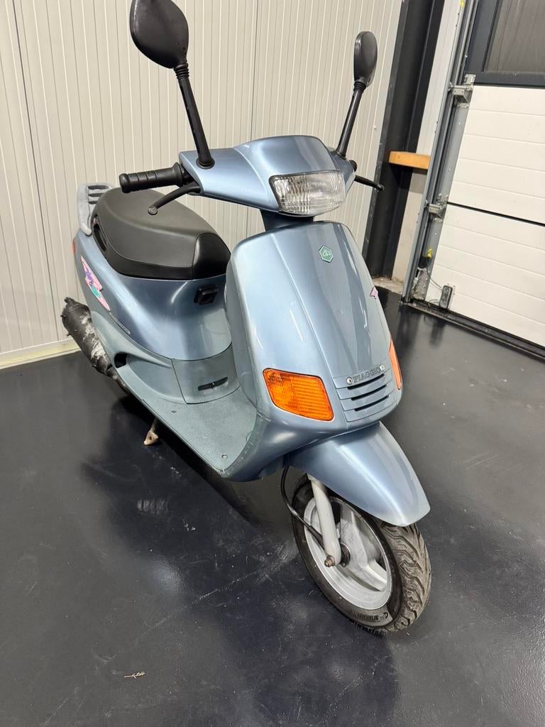 Piaggio Zip bimodale hybride . Unieke uitvoering, Ophalen