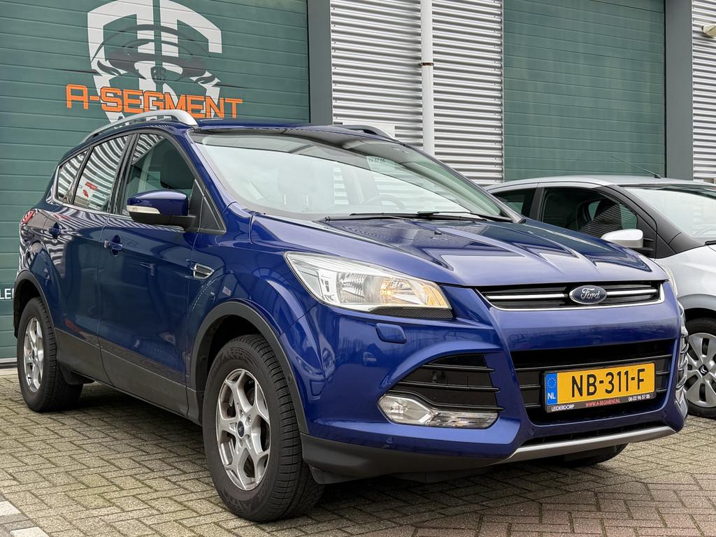 Ford Kuga 1.5 Titanium / Trekhaak / Camera / Cruise / NAP /, Auto's, Euro 6, 4 cilinders, Blauw, Leder en Stof