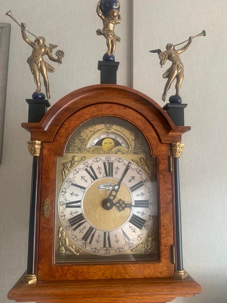 Staande klok, Ophalen