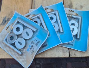 4 deurklink setjes inox beschikbaar voor biedingen