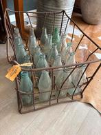 Flessenkrat met vintage flessen, Ophalen