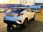 Toyota C-HR 1.8 Bi-Tone Wit - 122pk - Leder - JBL - Trekhaak, Auto's, Toyota, 725 kg, 4 cilinders, Leder, 75 €/maand