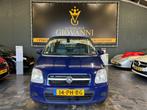 Opel Agila 1.2-16V Enjoy, Voorwielaandrijving, Gebruikt, Blauw, Origineel Nederlands