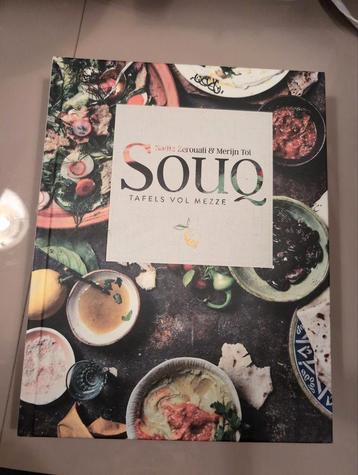 Souq. Tafels vol Mezze beschikbaar voor biedingen