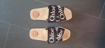 Cloe slippers ,zwarte band, als nieuw beschikbaar voor biedingen