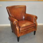 Rosan, een schapenleren fauteuil van Lounge Atelier, Huis en Inrichting, Fauteuils, Ophalen, Zo goed als nieuw, 50 tot 75 cm, Leer