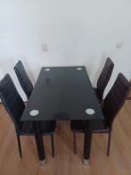 Moderne eettafel met 4 stoelen glas en kunstleer, Ophalen of Verzenden, Zo goed als nieuw