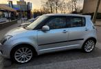 Suzuki Swift 1.3 5D 2009 Grijs, Auto's, Voorwielaandrijving, Stof, 400 kg, 1055 kg