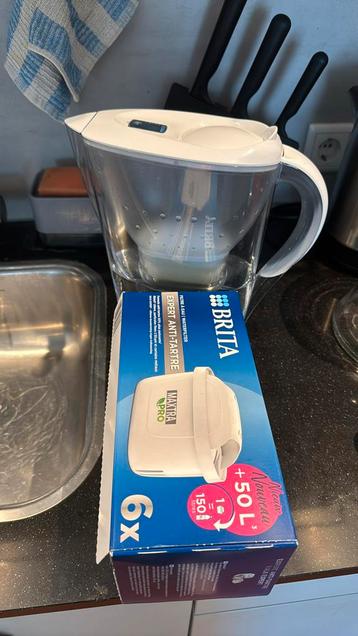 Brita waterfilter met 2 nieuwe filters beschikbaar voor biedingen